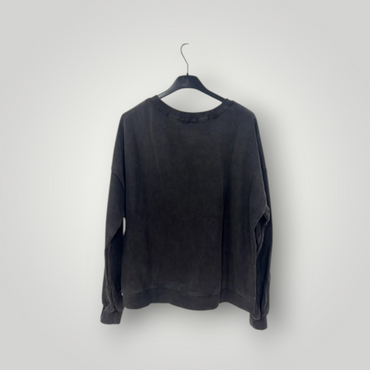 Parte trasera sudadera negra efecto lavado